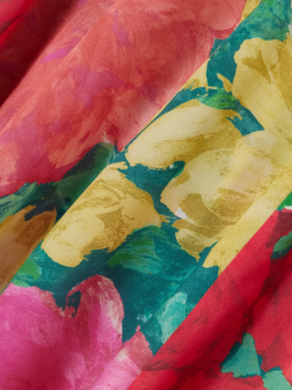 Close-up detail of the Balmain Paneled Floral-print Silk Maxi Skirt