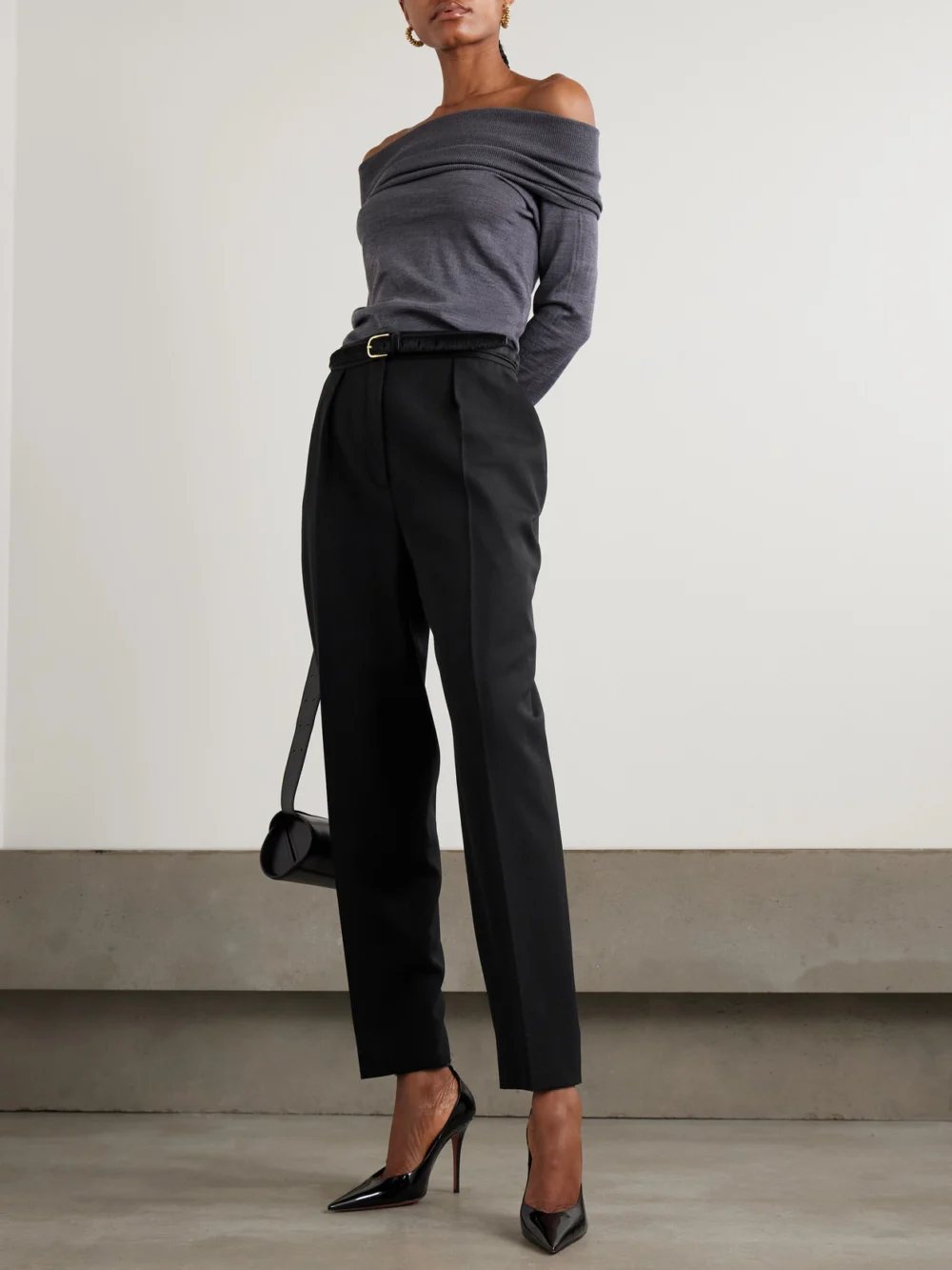 Balmain Pleated Grain De Poudre Wool Tapered Pants, worn by a model
