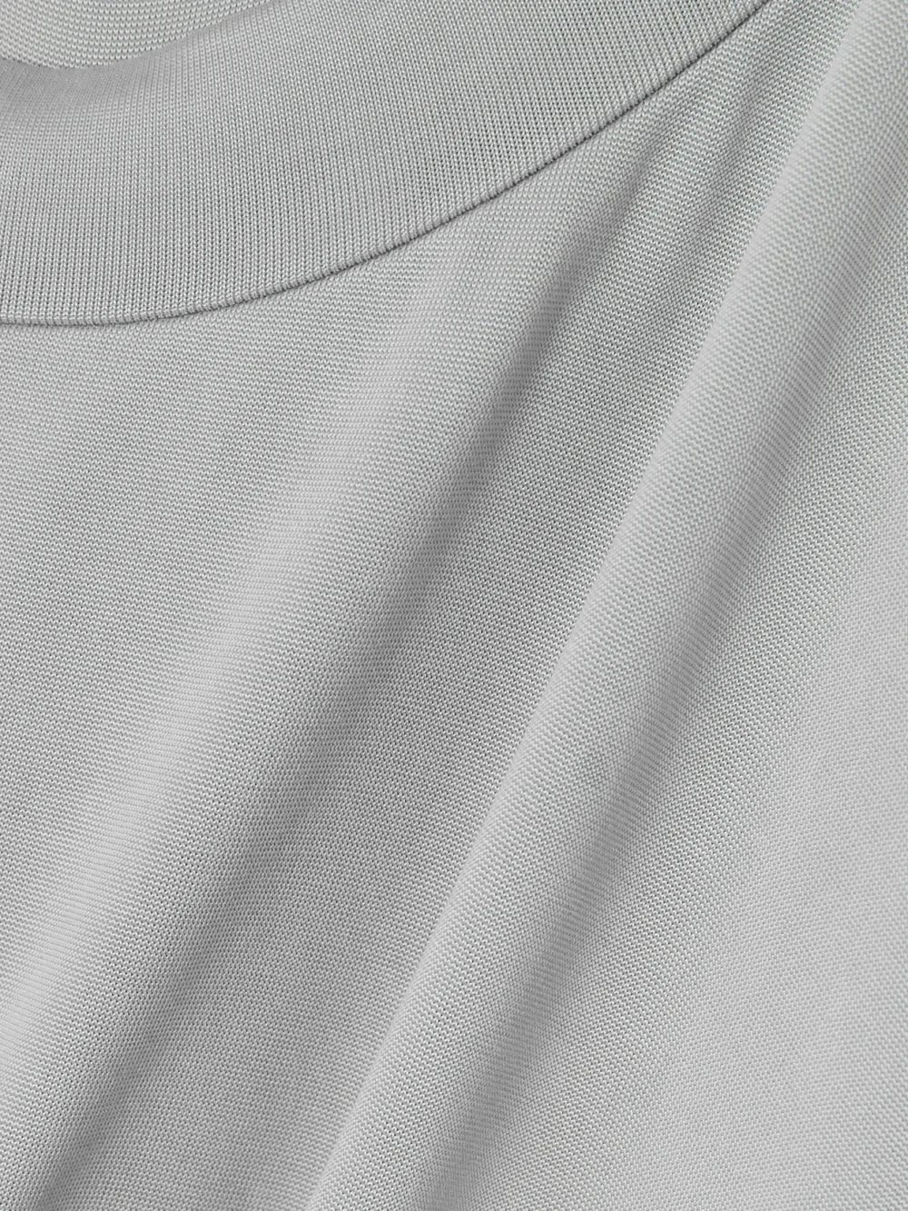 Close-up detail of the Balmain Ruched Stretch-jersey Maxi Dress