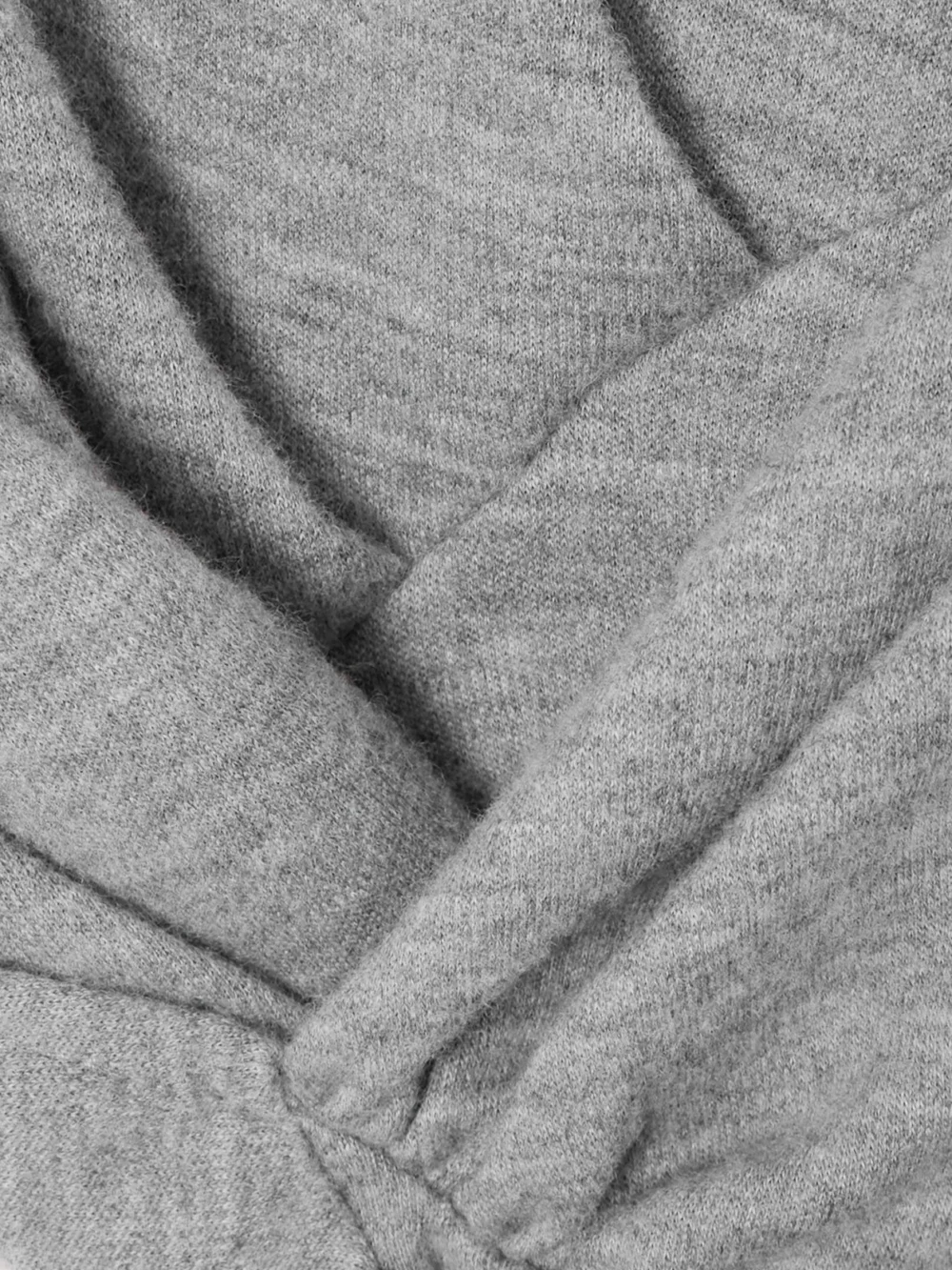 Close-up detail of the Balmain Ruched Wool-blend Top
