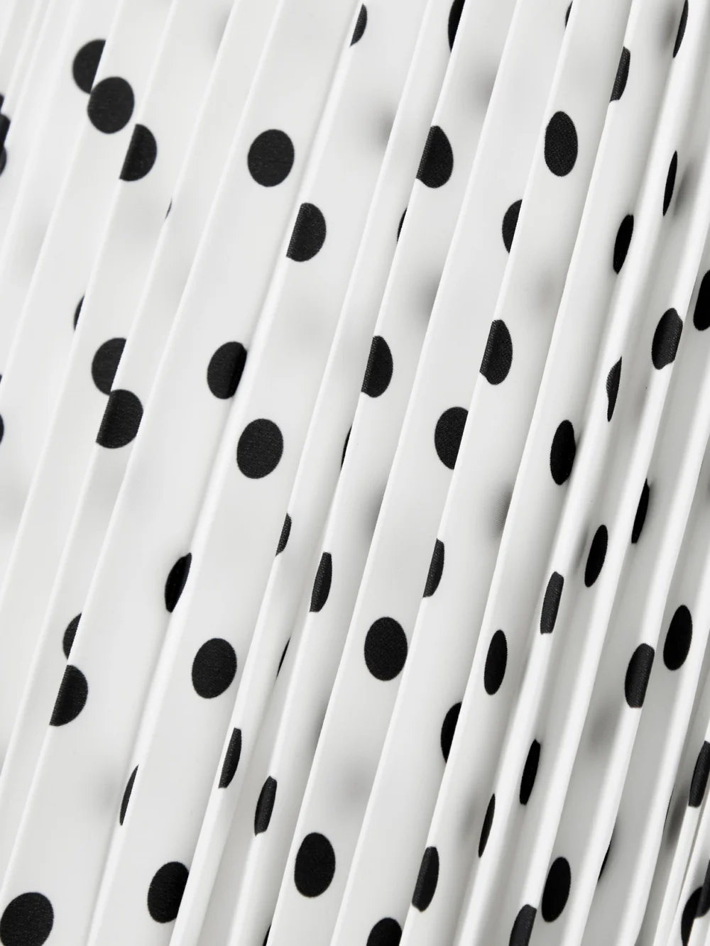 Close-up detail of the Balmain Ruffled Pleated Polka-dot Crepe Maxi Skirt