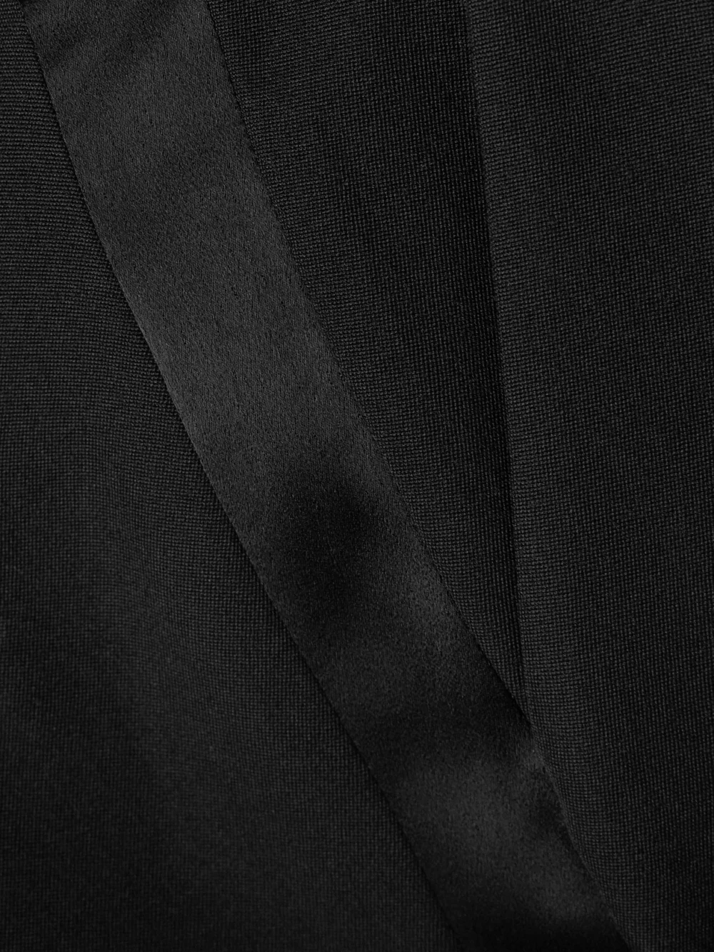 Close-up detail of the Balmain Satin-trimmed Wool Straight-leg Pants