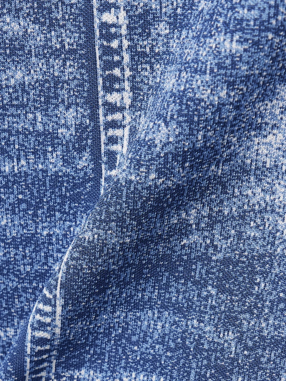 Close-up detail of the Balmain Trompe-l'ail Printed Knitted Midi Skirt