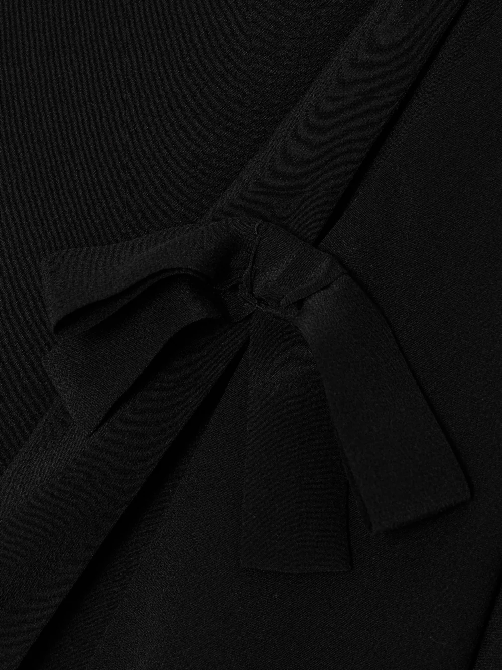 Close-up detail of the Bernadette Bow-embellished Silk Crepe De Chine Midi Dress