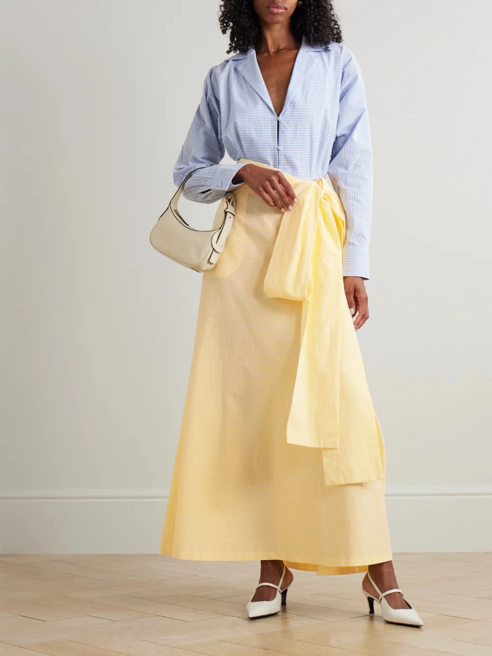 Bernadette Clarence Belted Striped Cotton-seersucker Maxi Shirt Dress, worn by a model