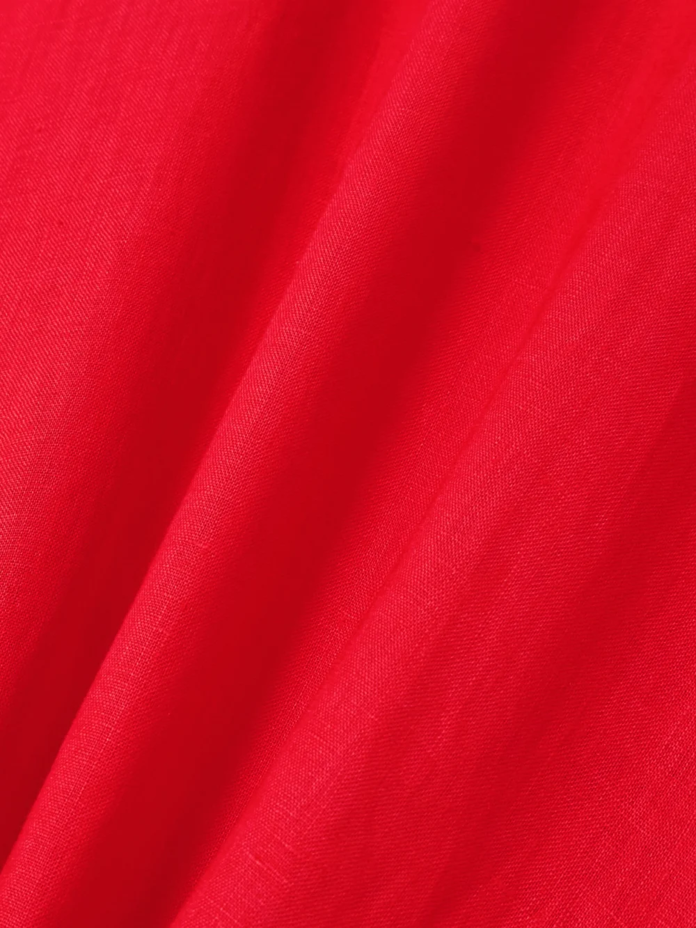 Close-up detail of the Bernadette Fran Open-back Linen Maxi Dress