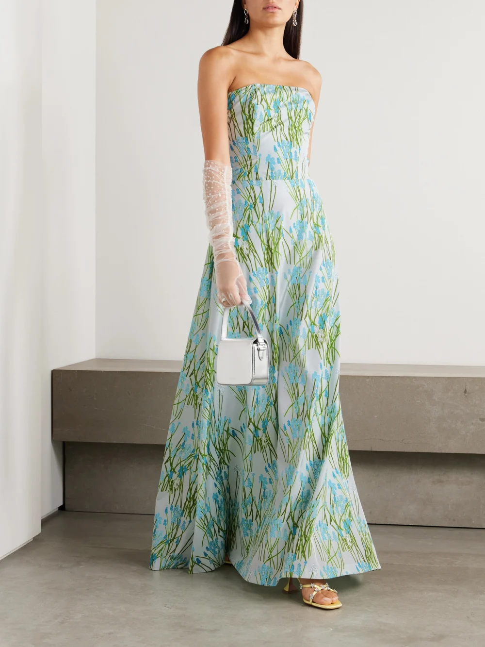Bernadette Lena Cropped Strapless Floral-print Woven Top, worn by a model