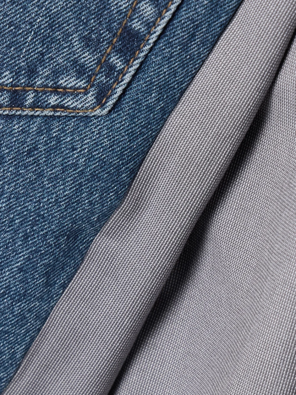 Close-up detail of the Bettter Denitrouser Paneled Pleated Wool-blend and Denim Pants