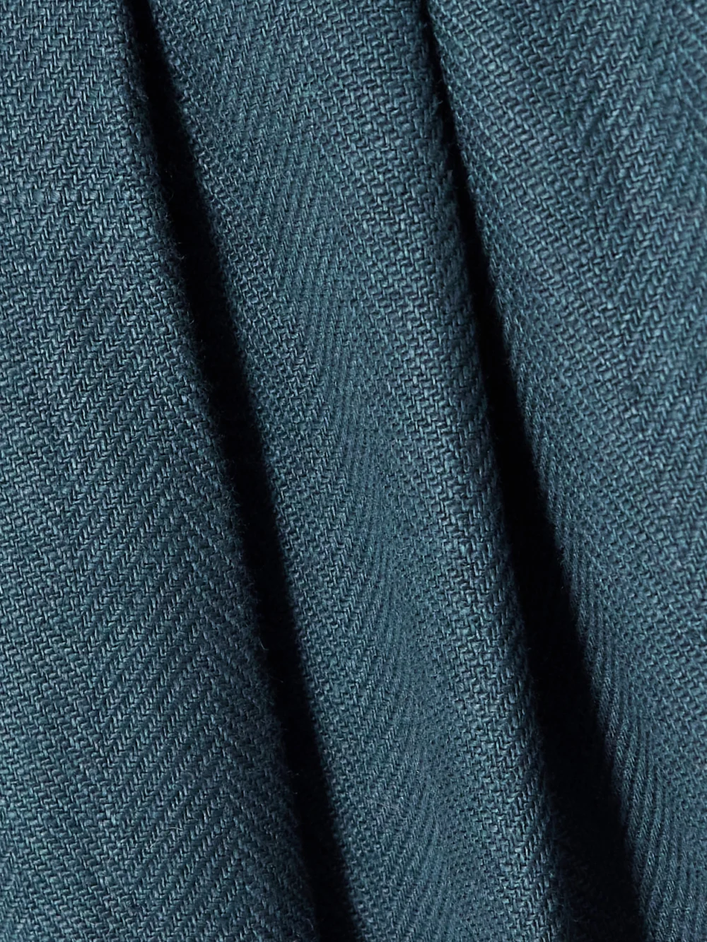Close-up detail of the BLAZÉ Milano Clarity Pleated Herringbone Linen Shorts