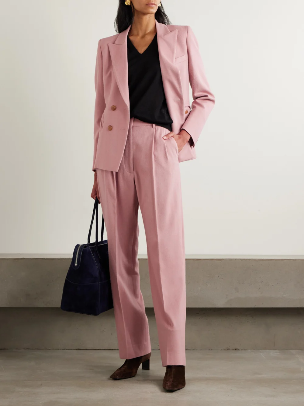BLAZÉ Milano Fox Pleated Wool and Cashmere-blend Tapered Pants, worn by a model
