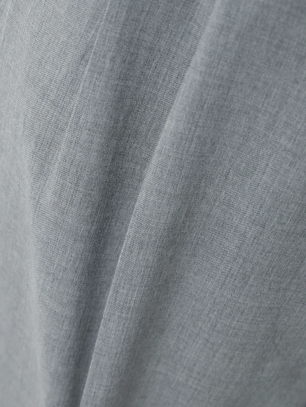 Close-up detail of the BLAZÉ Milano Fox Pleated Wool-twill Straight-leg Pants