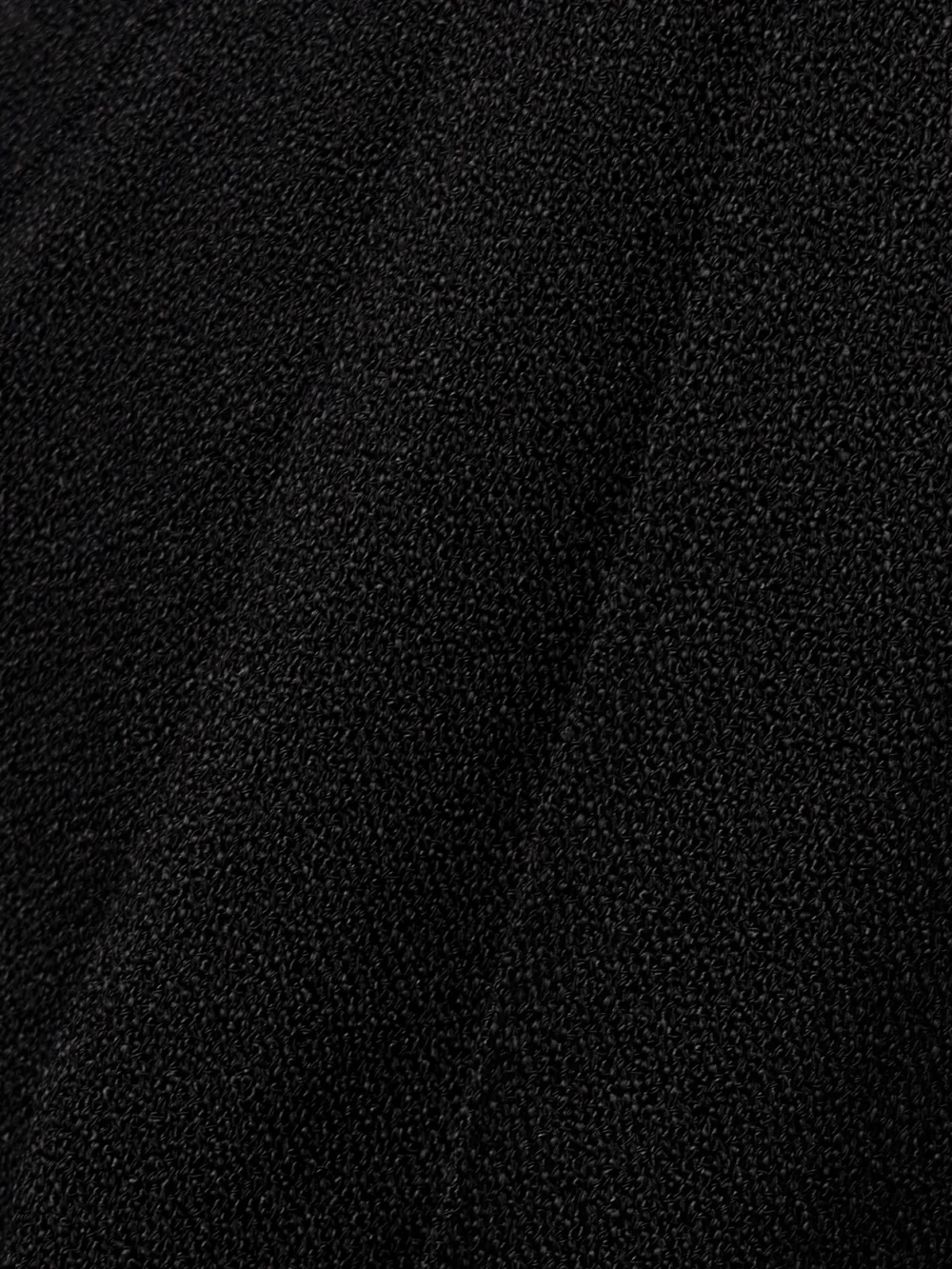 Close-up detail of the BLAZÉ Milano Husi Pleated Crepe Straight-leg Pants