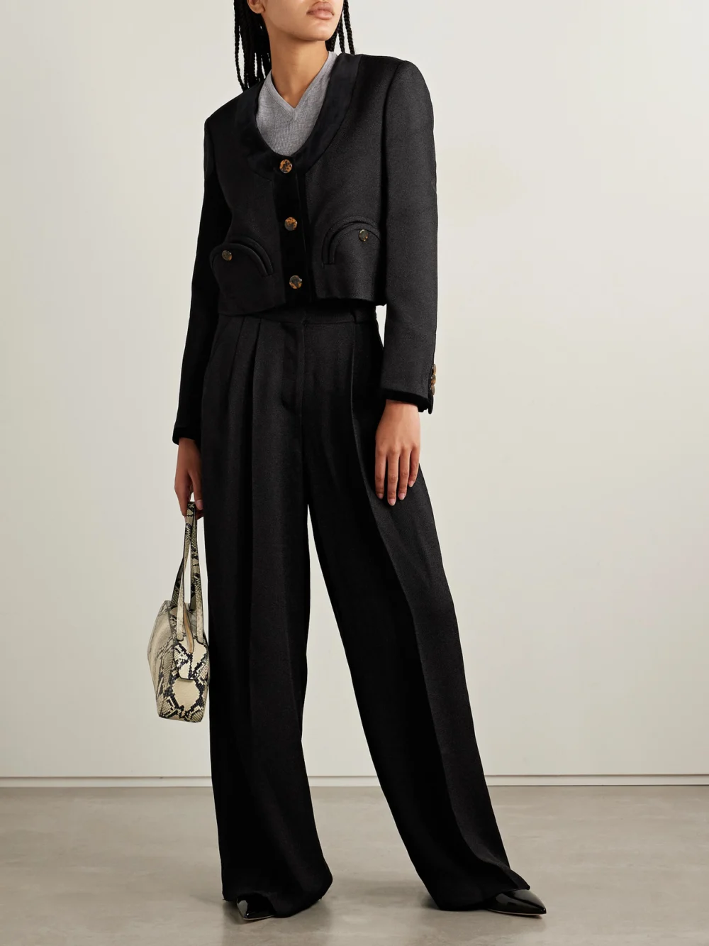 BLAZÉ Milano Husi Pleated Crepe Straight-leg Pants, worn by a model
