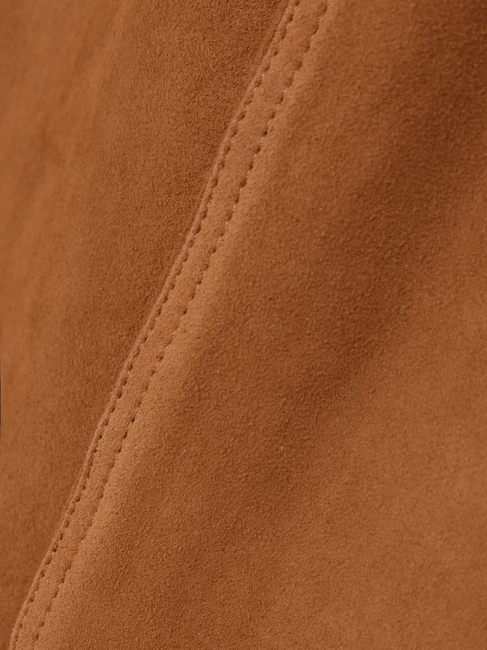 Close-up detail of the BLAZÉ Milano Paso Paneled Suede Straight-leg Pants
