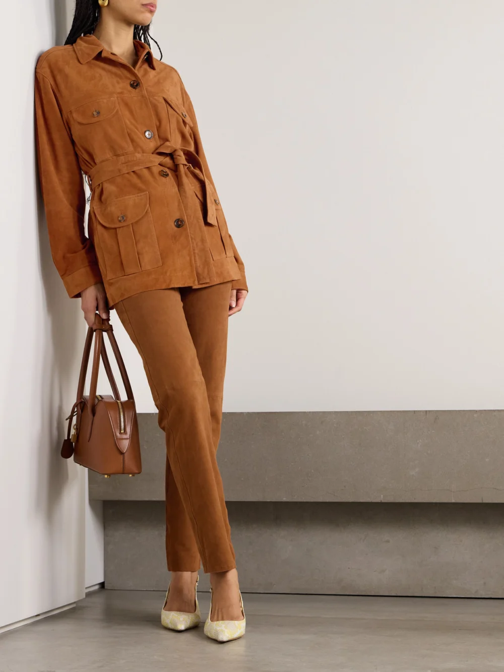 BLAZÉ Milano Paso Paneled Suede Straight-leg Pants, worn by a model