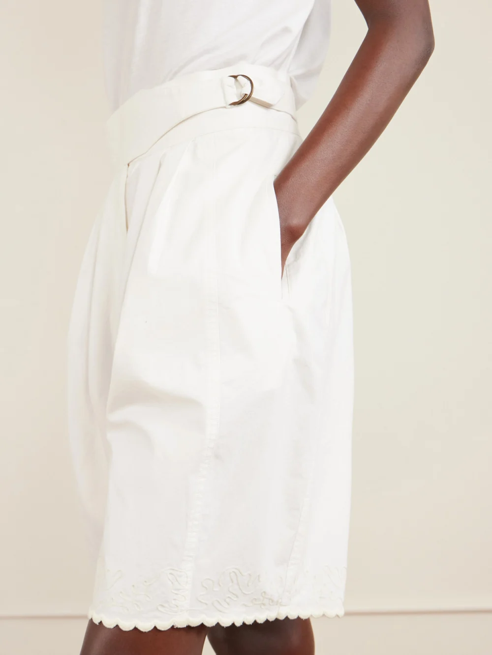 Close-up detail of the Bode Closerie Belted Scalloped Embroidered Cotton-poplin Shorts