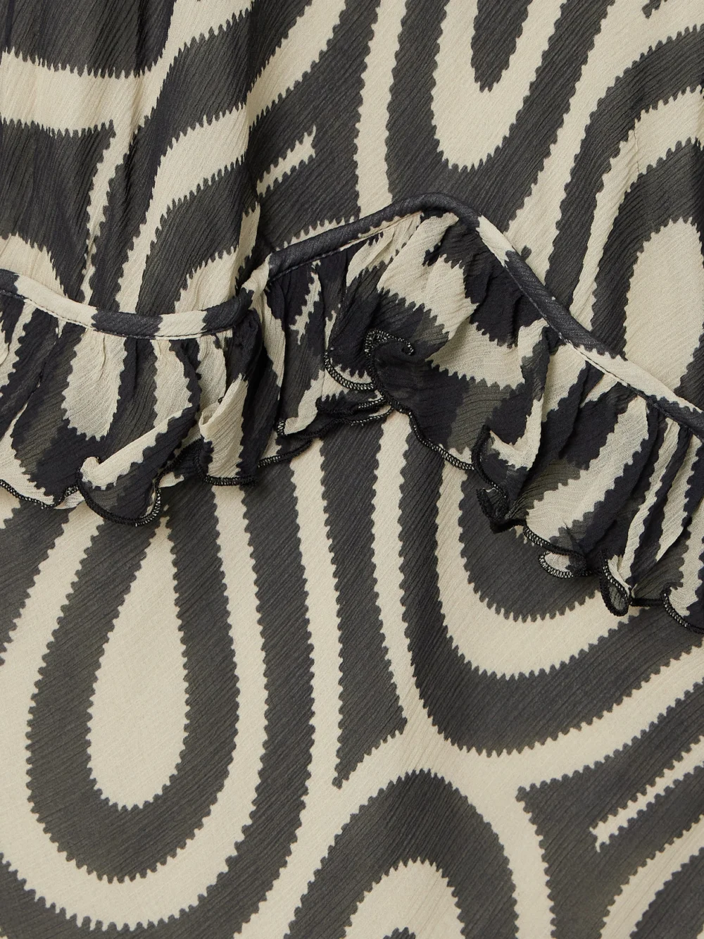 Close-up detail of the Bode Comber Ruffled Printed Silk-chiffon Maxi Dress
