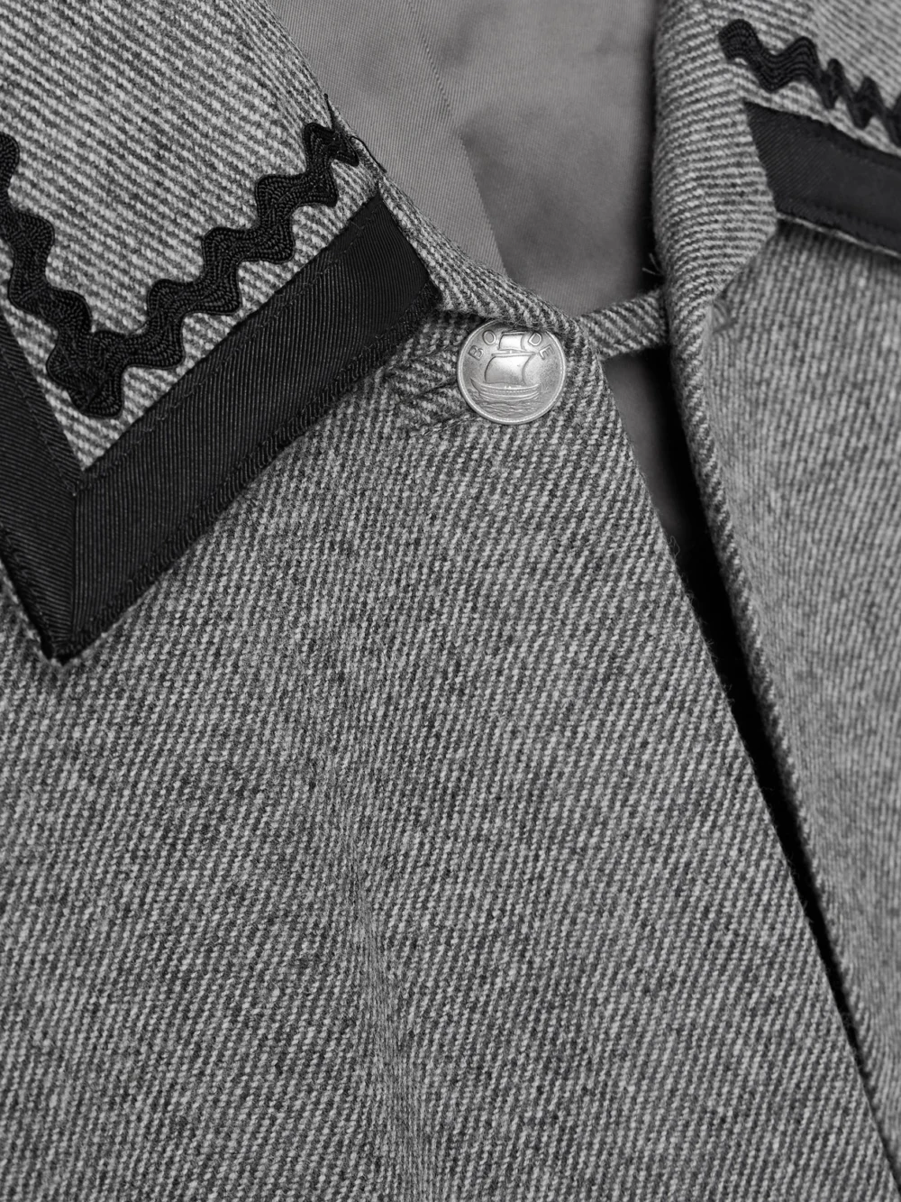 Close-up detail of the Bode Dovecote Cropped Cotton Twill-trimmed Wool-twill Jacket