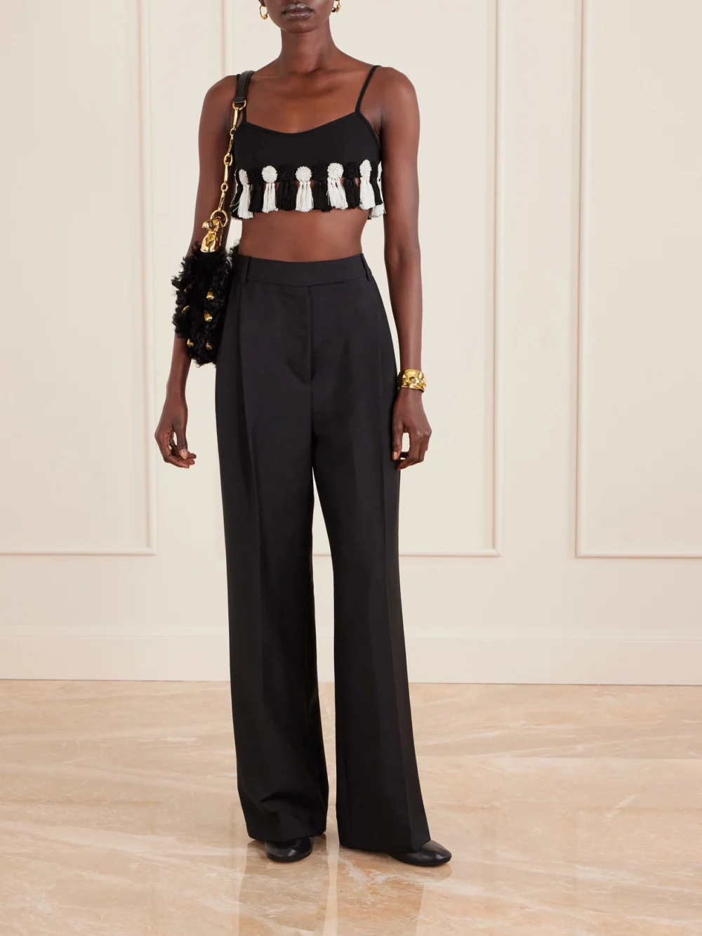 Bode Folly Tasseled Wool-crepe Bralette, worn by a model