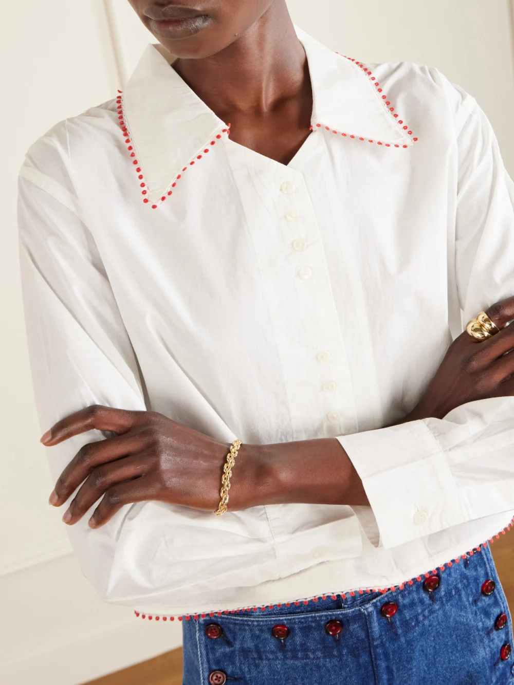 Close-up detail of the Bode Redbud Cropped Embroidered Cotton-poplin Shirt