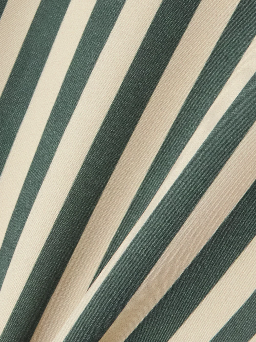 Close-up detail of the Bode Soda Striped Silk Shorts