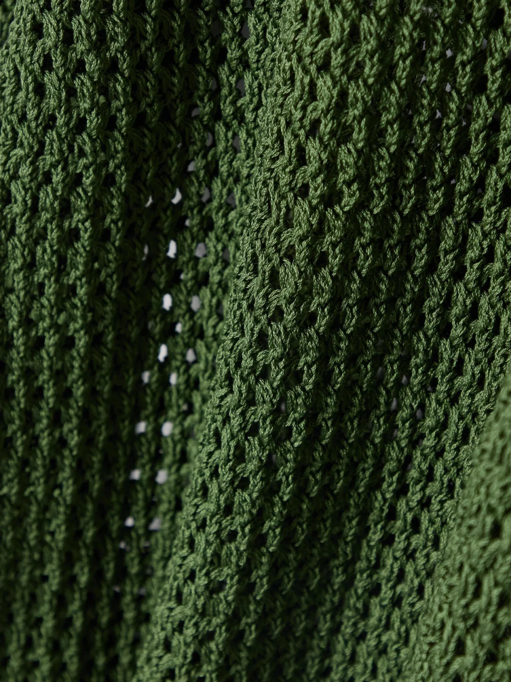 Close-up detail of the Bode Willows Crocheted Cotton Polo Shirt