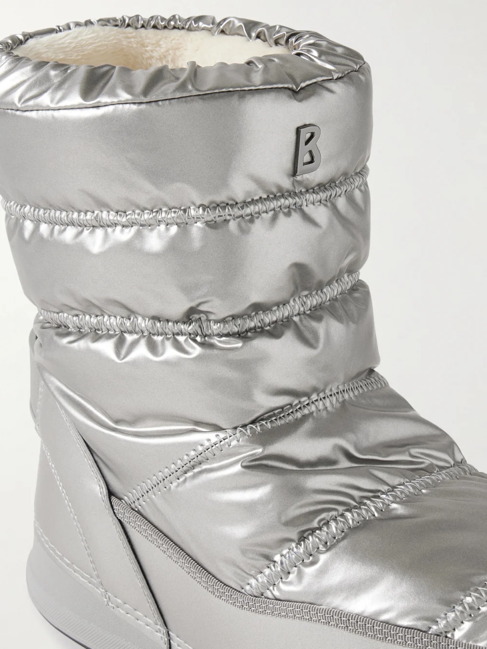 Close-up detail of the Bogner La Plagne 19 Leather-trimmed Quilted Metallic Shell Snow Boots