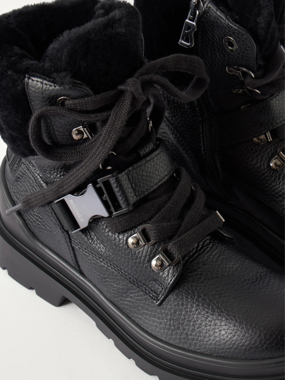Close-up detail of the Bogner St. Moritz Buckled Shearling-lined Textured-leather Ankle Boots