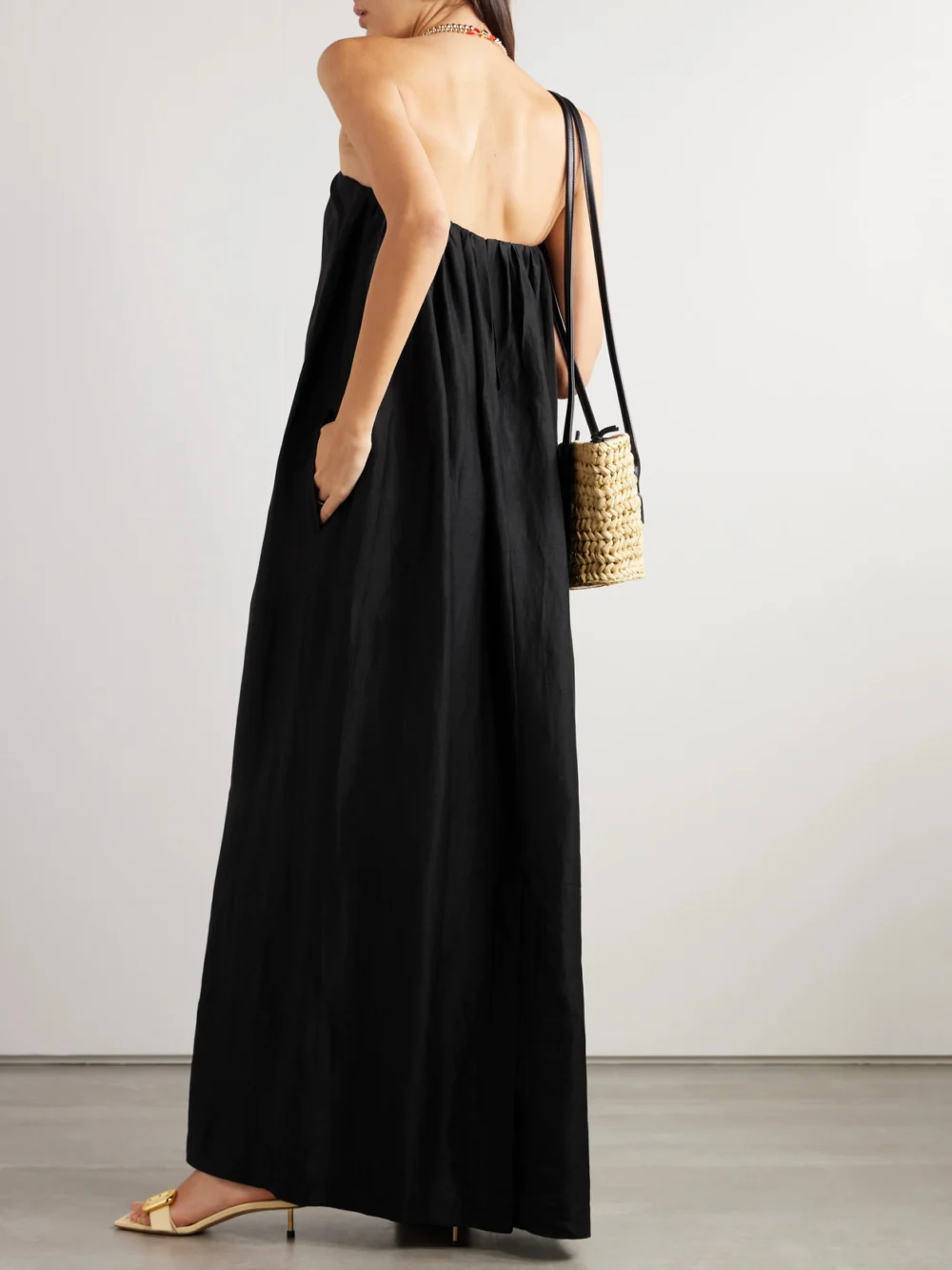 Back view of the Bondi Born Bormio Strapless Woven Maxi Dress