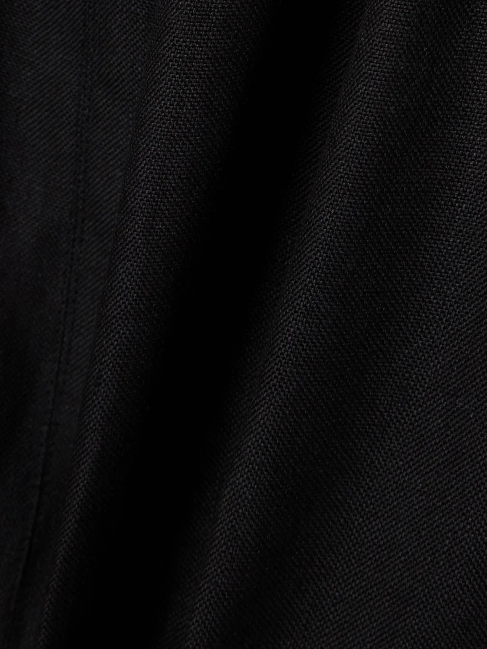 Close-up detail of the Bondi Born Bormio Strapless Woven Maxi Dress