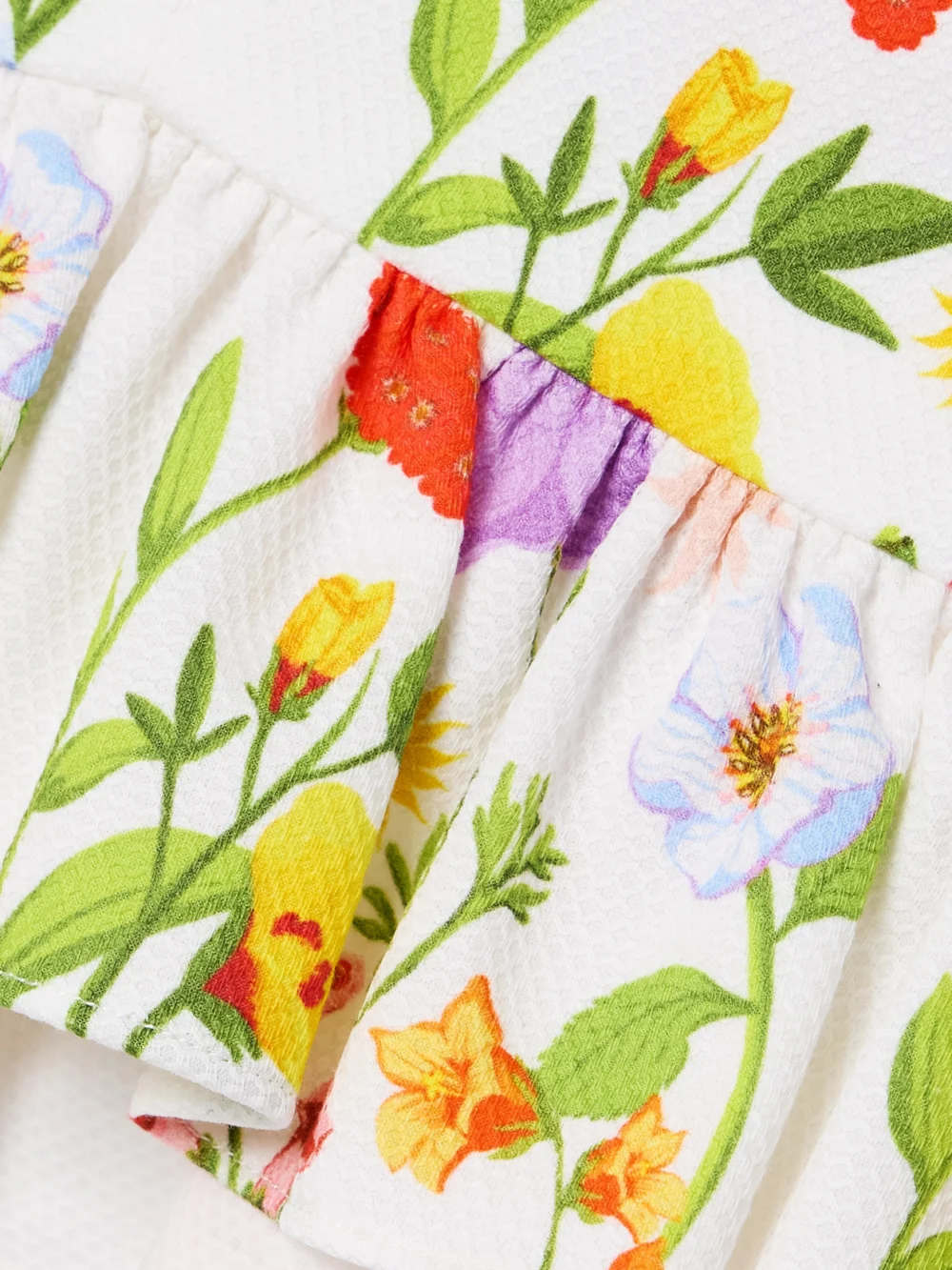 Close-up detail of the Borgo de Nor Callie Cutout Printed Cotton-blend Piqué Peplum Top