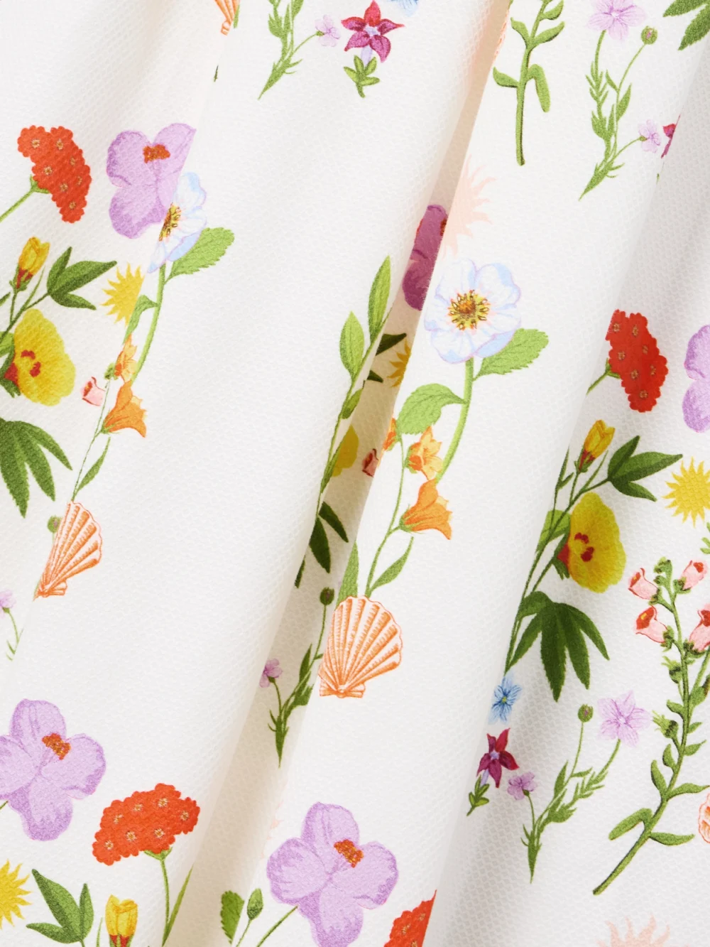 Close-up detail of the Borgo de Nor Gracie Off-the-shoulder Pleated Printed Cotton-blend Piqué Dress