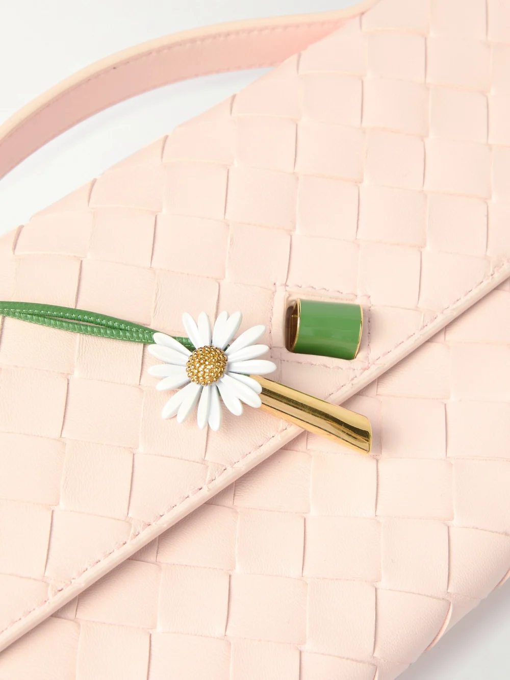 Close-up detail of the Bottega Veneta Andiamo Long Embellished Intrecciato Leather Clutch