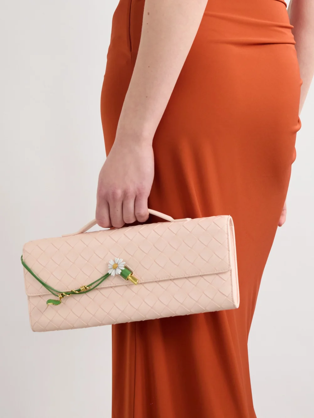Bottega Veneta Andiamo Long Embellished Intrecciato Leather Clutch, styled view
