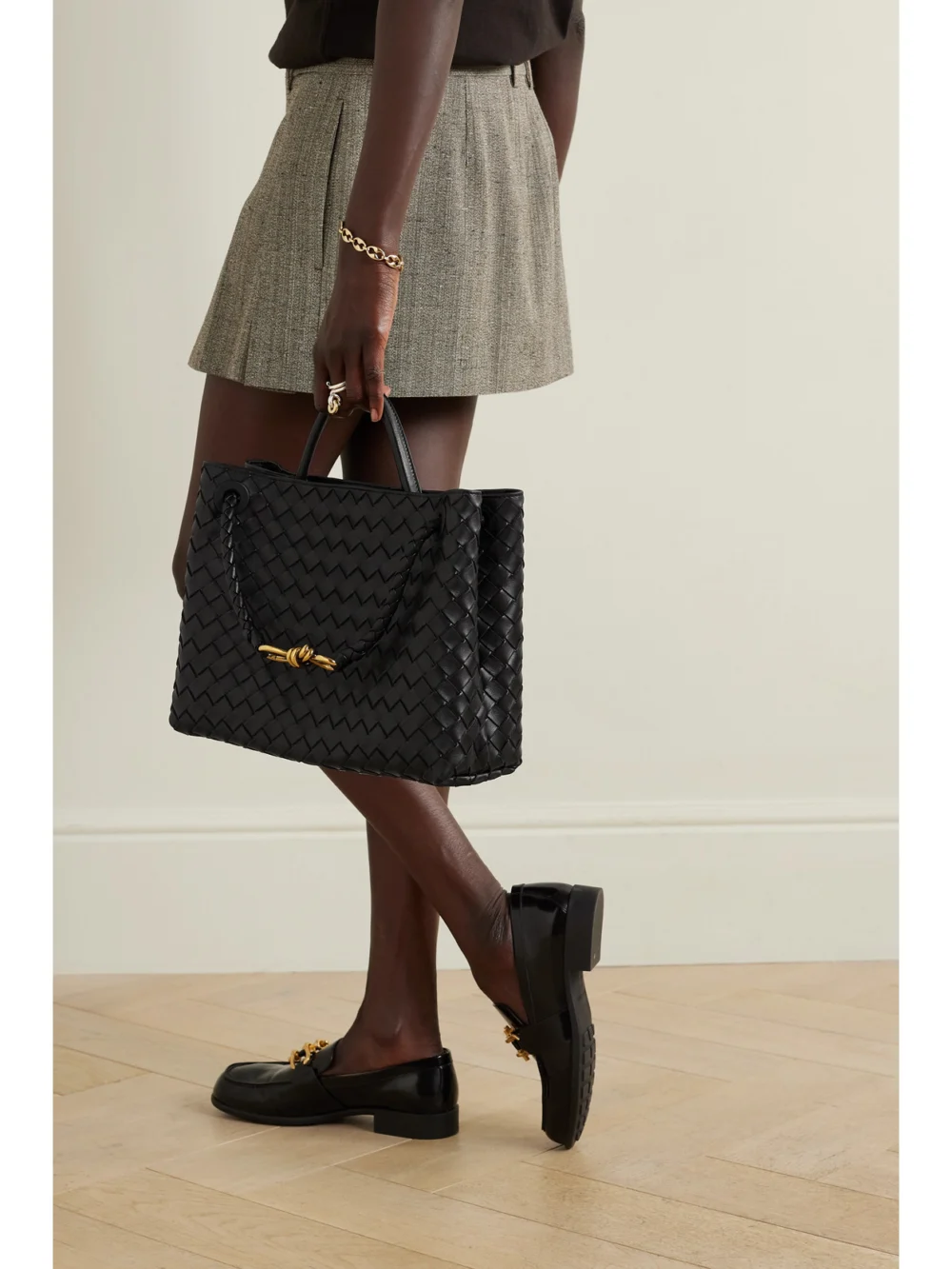 Bottega Veneta Andiamo Medium Intrecciato Leather Top-handle Bag, styled view