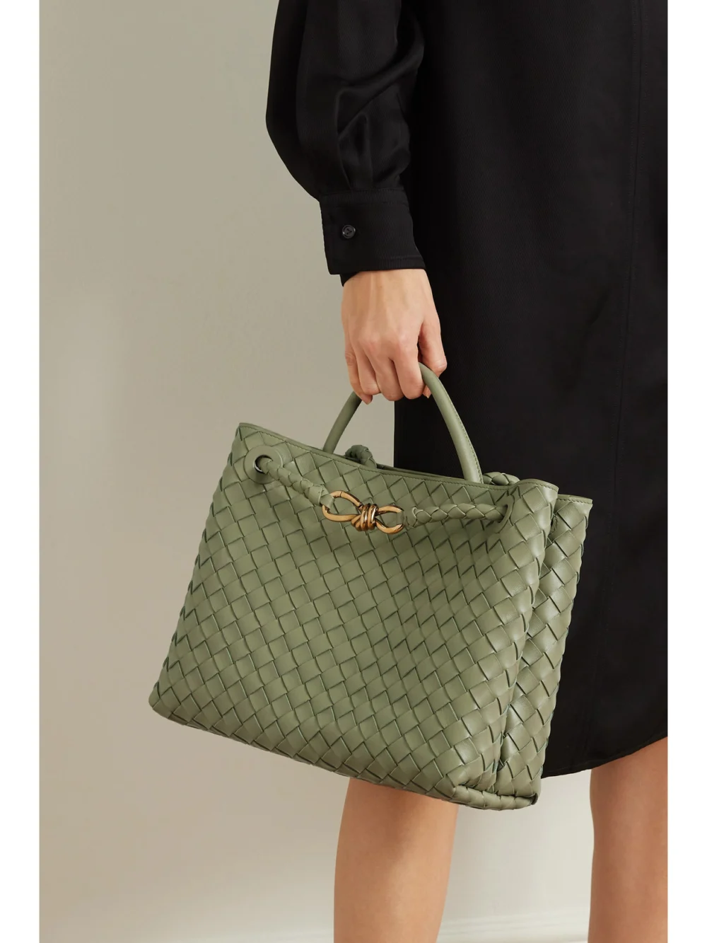 Bottega Veneta Andiamo Medium Intrecciato Leather Top-handle Bag, styled view