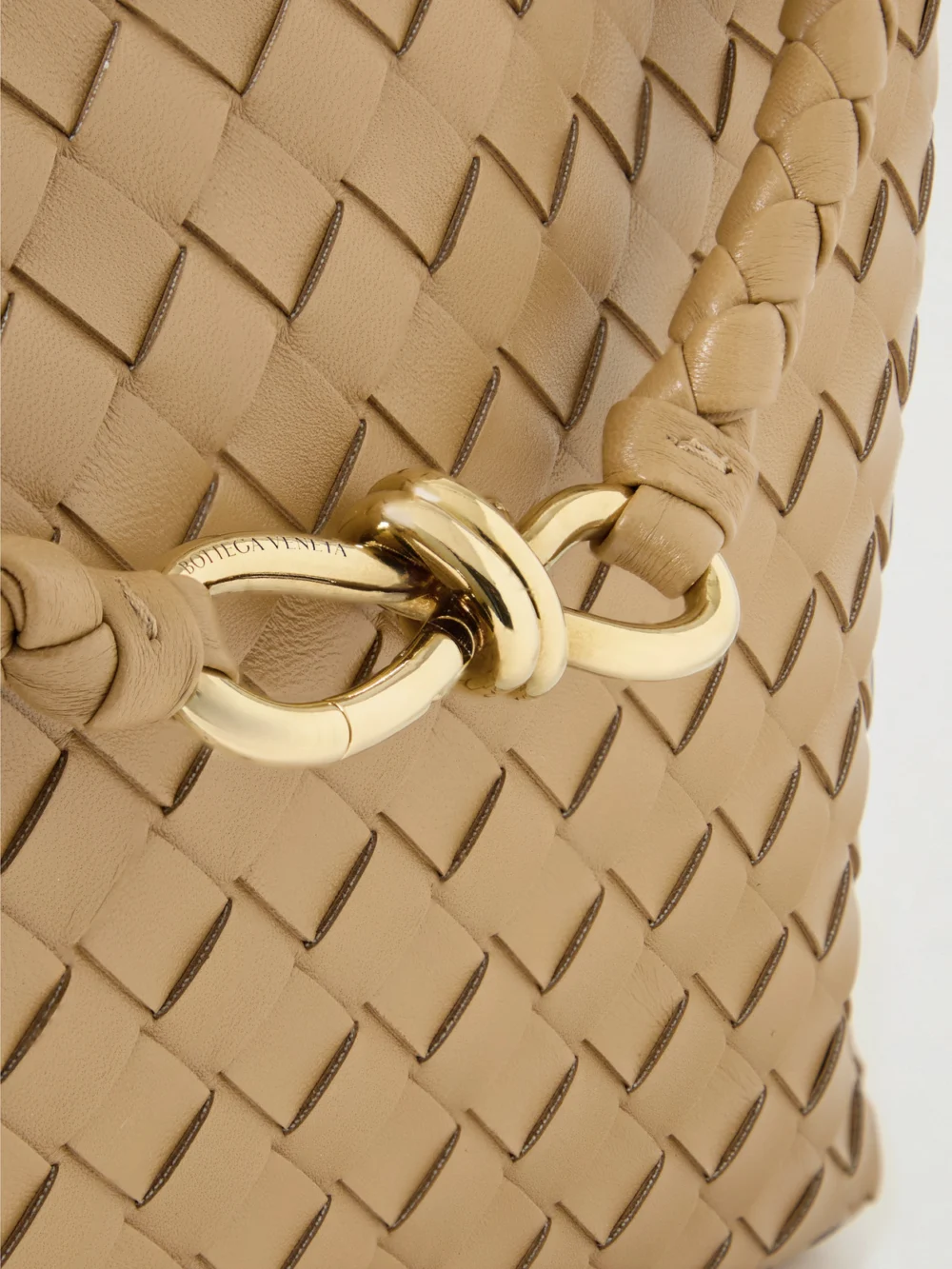 Close-up detail of the Bottega Veneta Andiamo Medium Intrecciato Leather Top-handle Bag