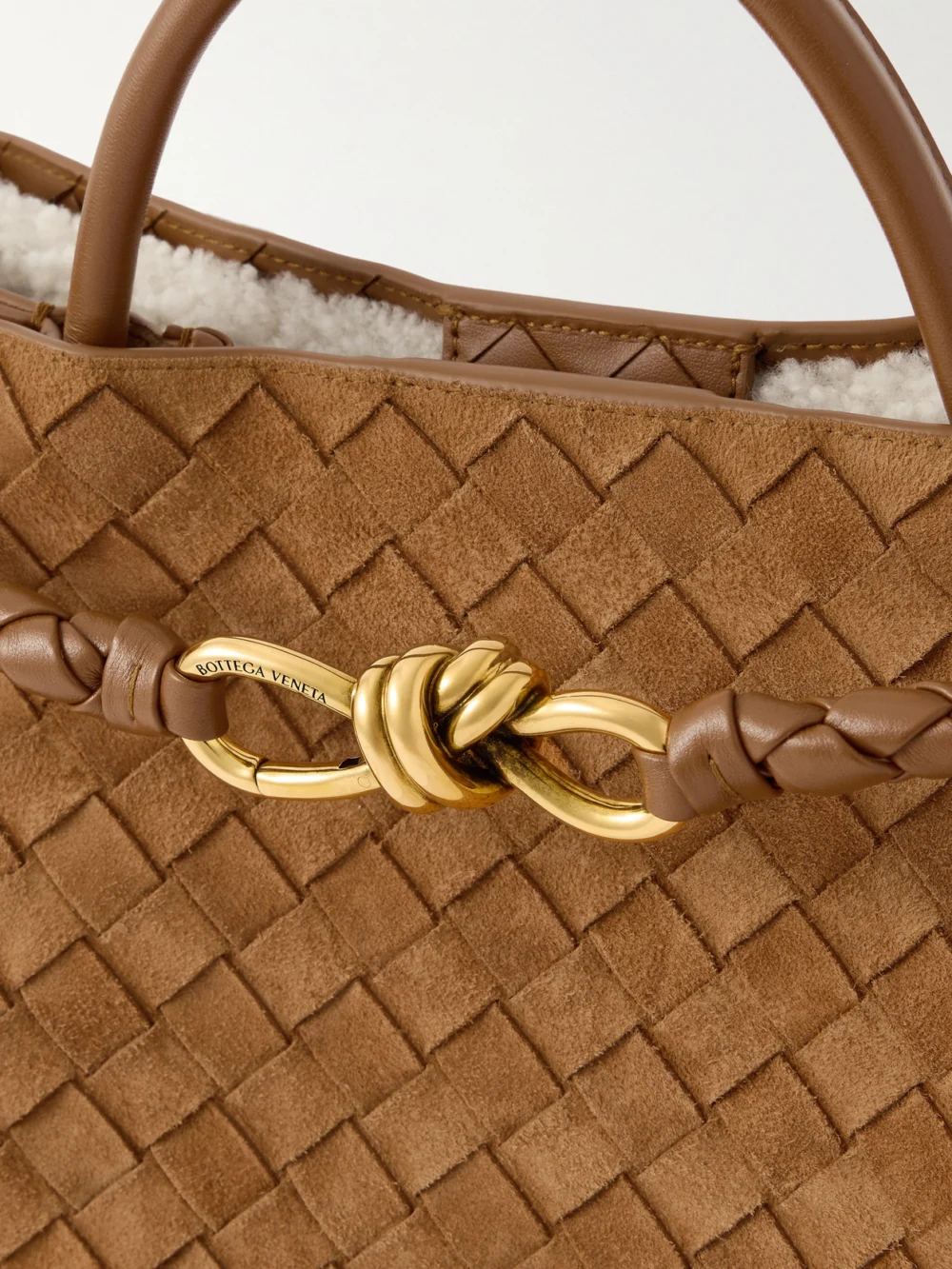 Close-up detail of the Bottega Veneta Andiamo Medium Shearling-lined Leather-trimmed Intrecciato Suede Tote