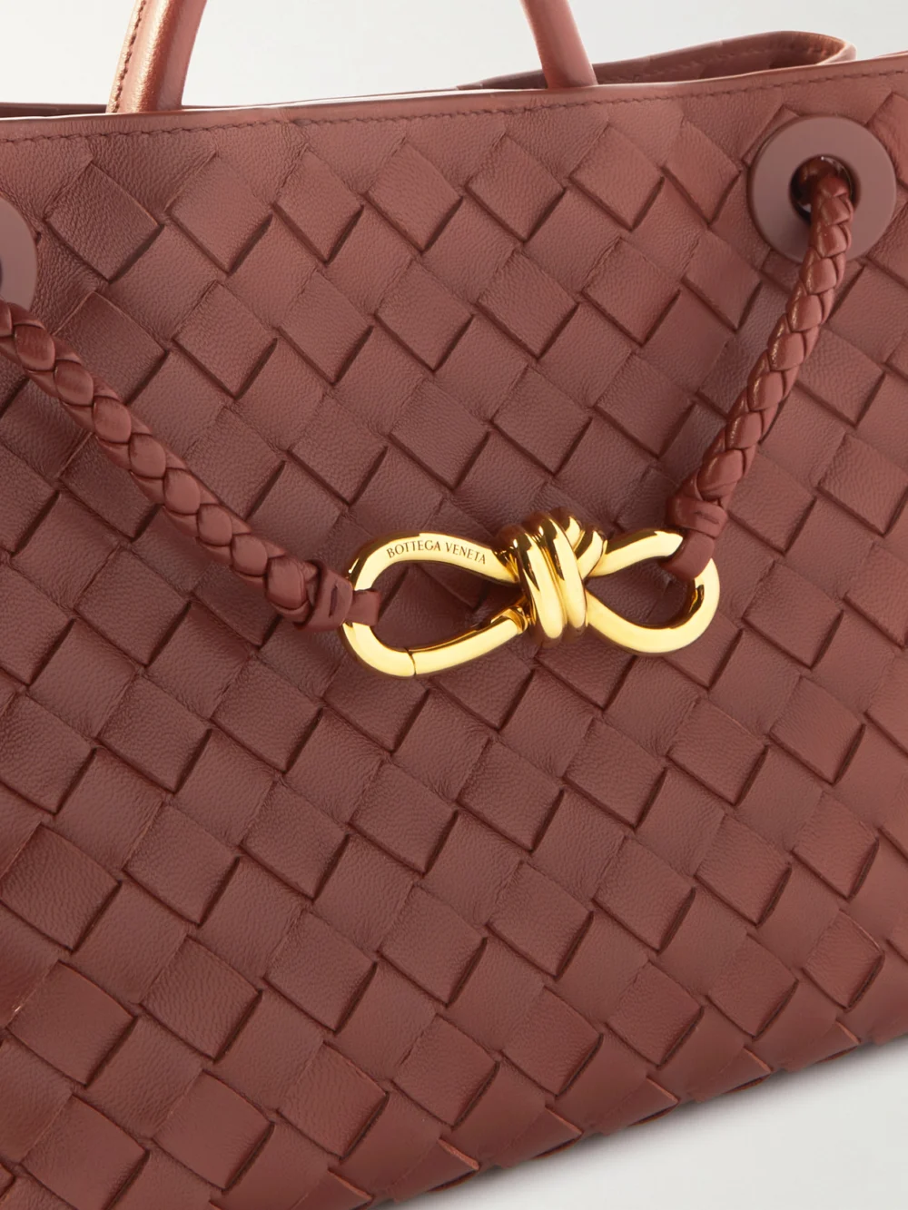 Close-up detail of the Bottega Veneta Andiamo Small Intrecciato Leather Top-handle Bag