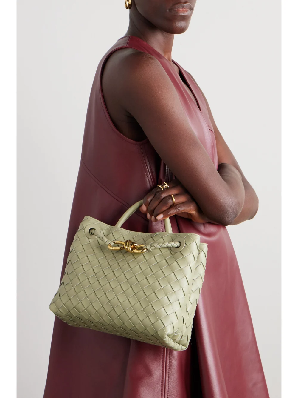 Bottega Veneta Andiamo Small Intrecciato Leather Top-handle Bag, styled view