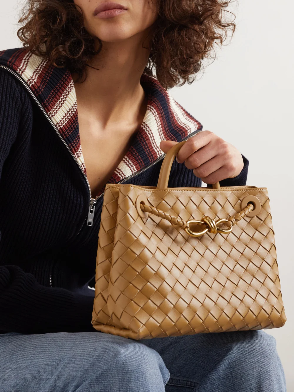 Bottega Veneta Andiamo Small Intrecciato Leather Top-handle Bag, styled view