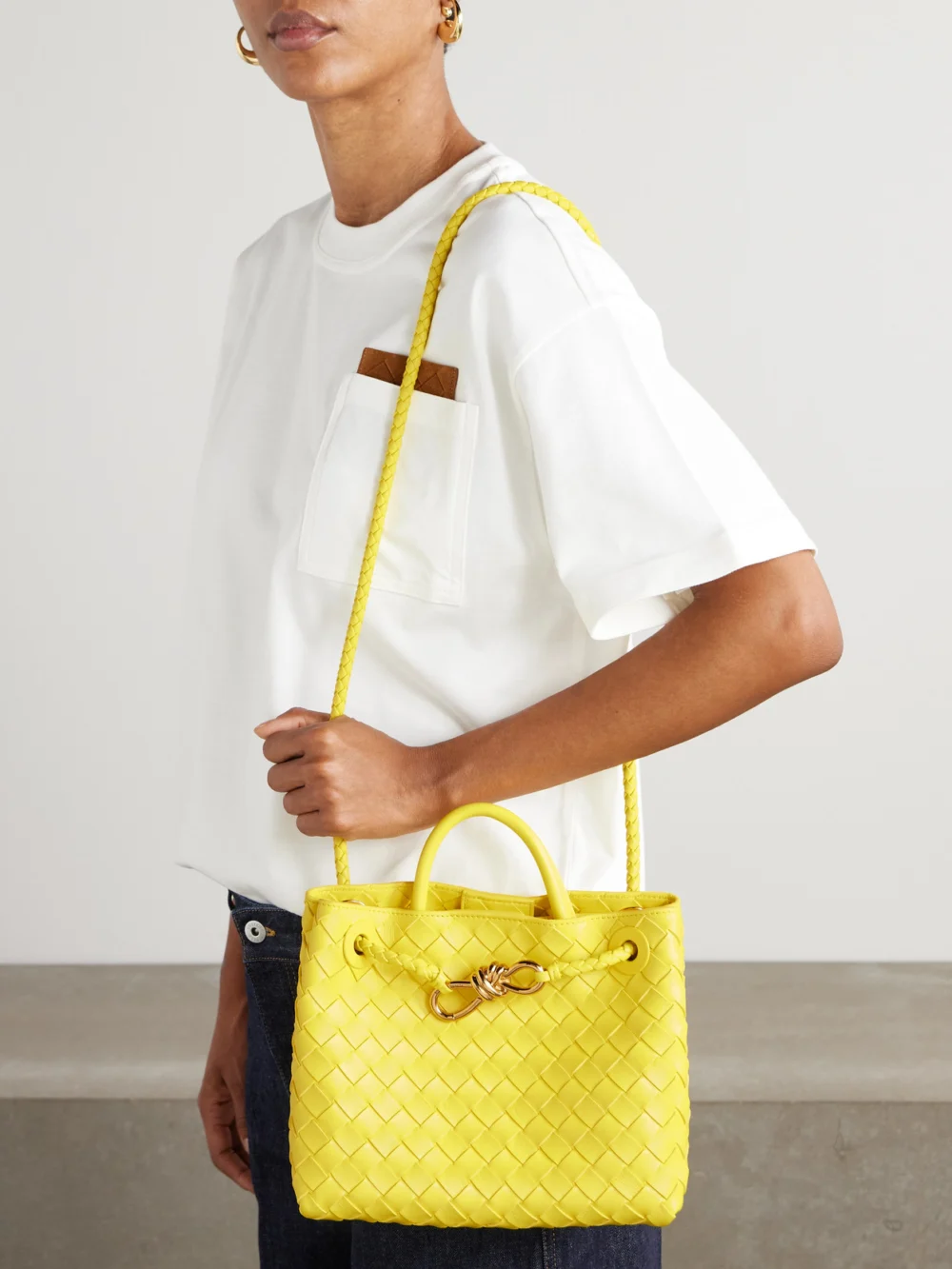 Bottega Veneta Andiamo Small Intrecciato Leather Top-handle Bag, styled view