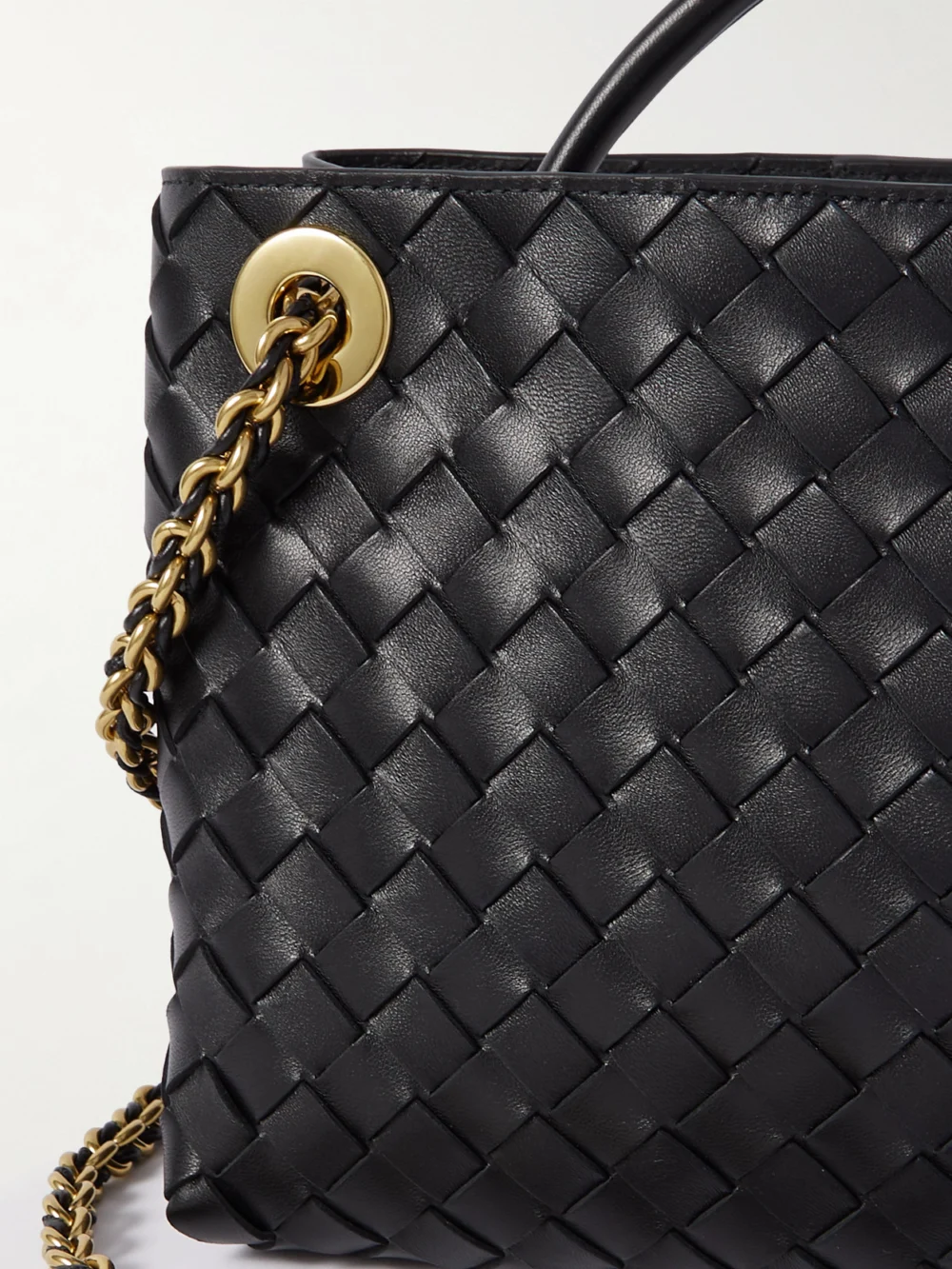 Close-up detail of the Bottega Veneta Andiamo with Chain Small Intrecciato Leather Shoulder Bag