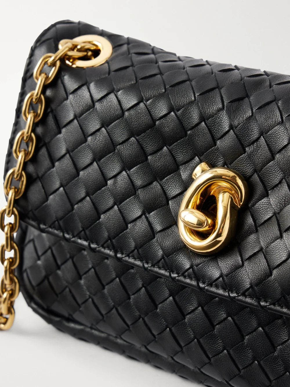 Close-up detail of the Bottega Veneta Baby Madison Leather Shoulder Bag