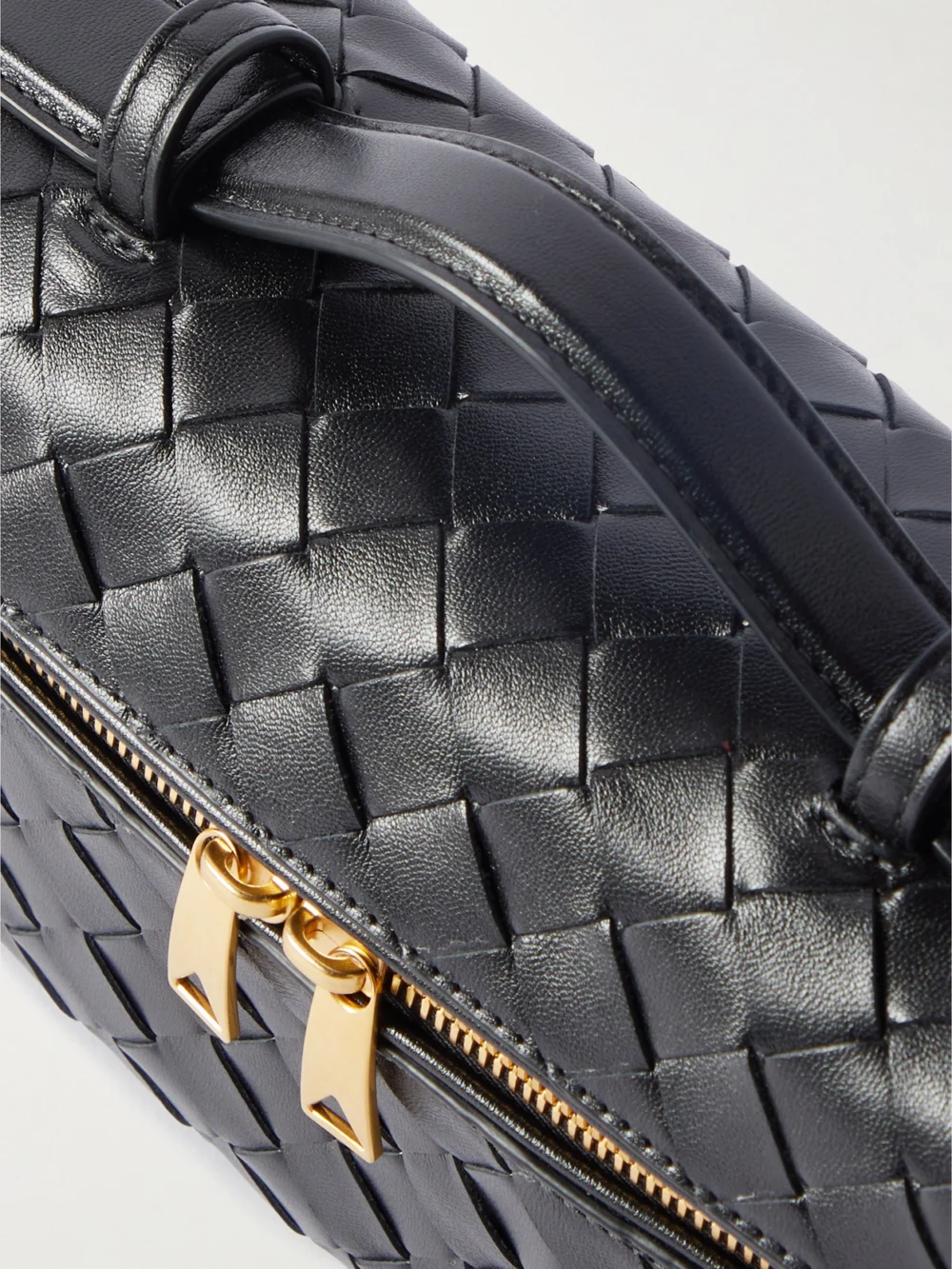 Close-up detail of the Bottega Veneta Bang Bang Intrecciato Leather Top-handle Bag