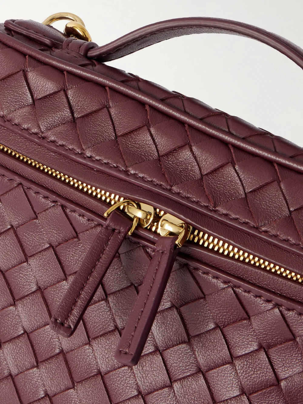 Close-up detail of the Bottega Veneta Bang Bang Small Intrecciato Leather Tote