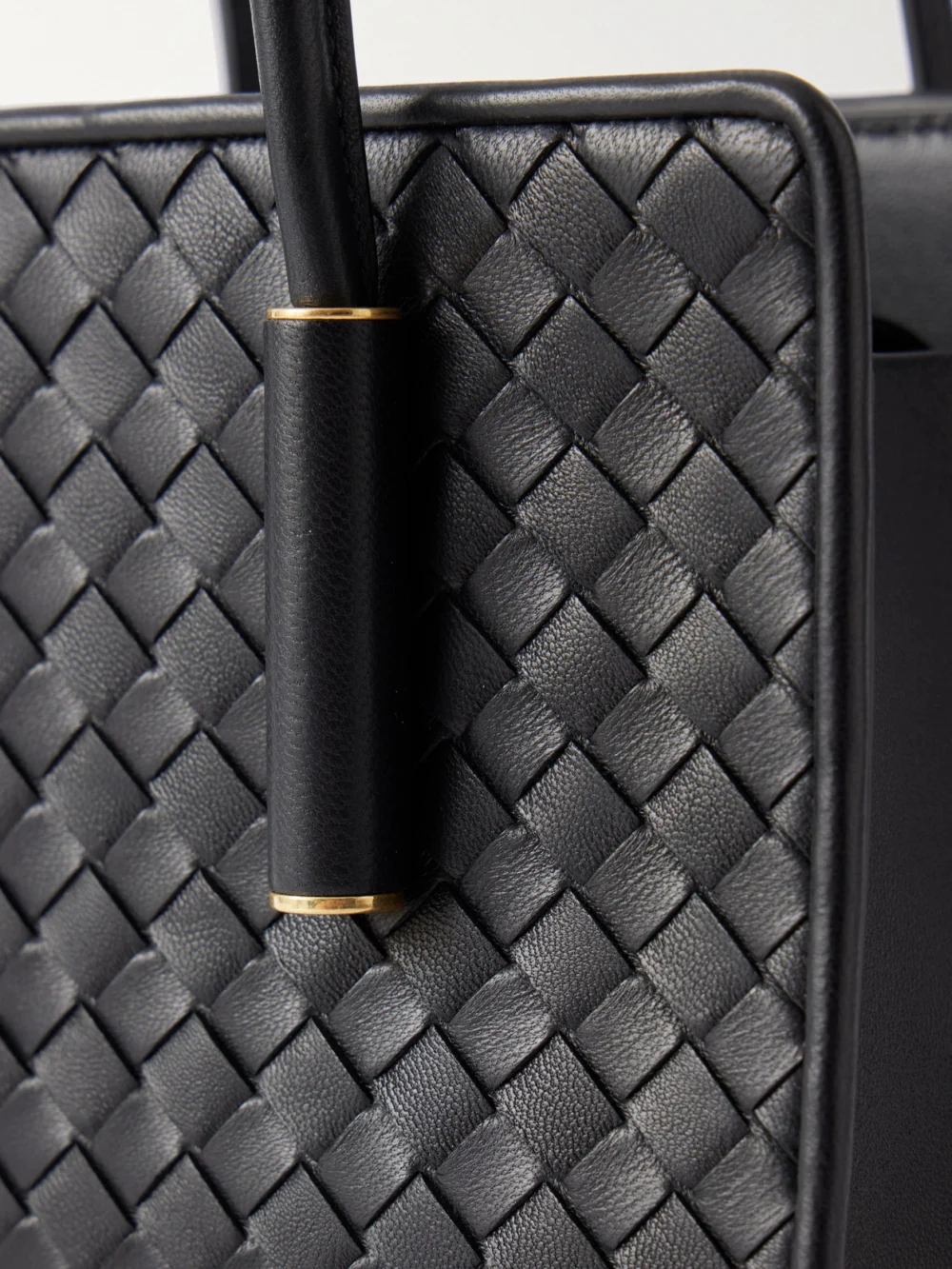 Close-up detail of the Bottega Veneta Barbara Mini Intrecciato Leather Tote