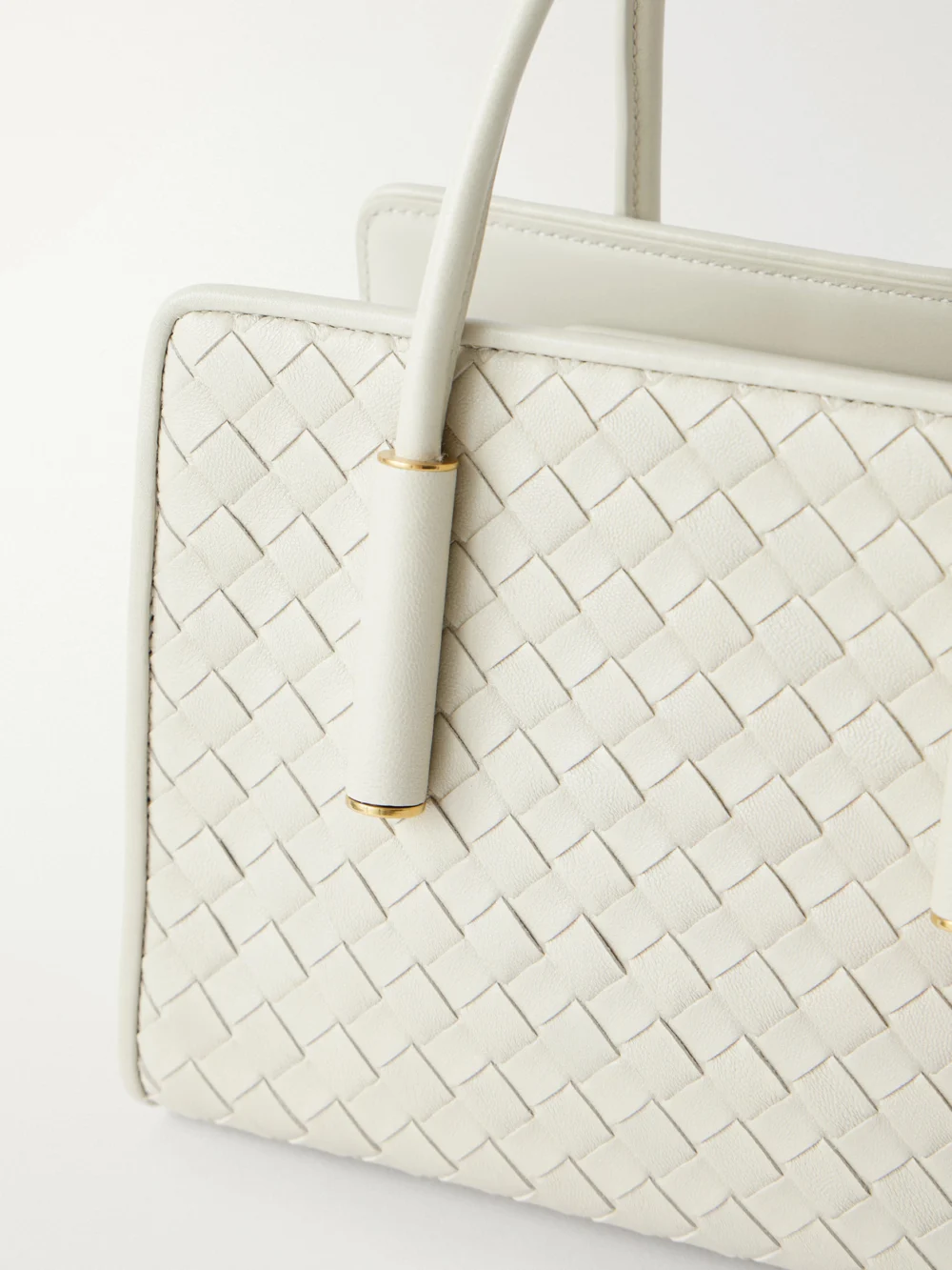 Close-up detail of the Bottega Veneta Barbara Mini Intrecciato Leather Tote