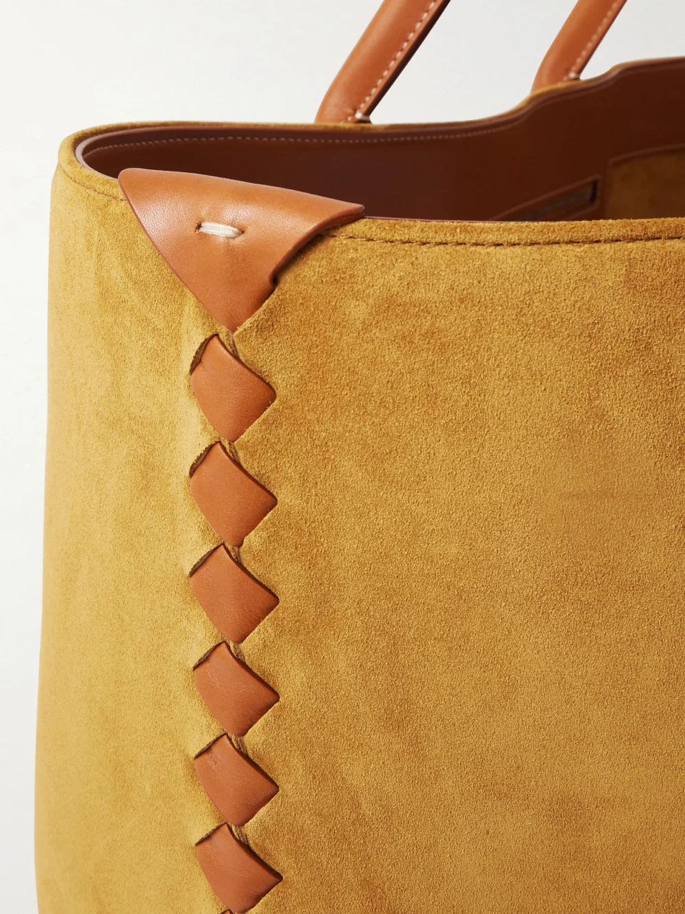 Close-up detail of the Bottega Veneta Cabat Large Leather-trimmed Suede Tote
