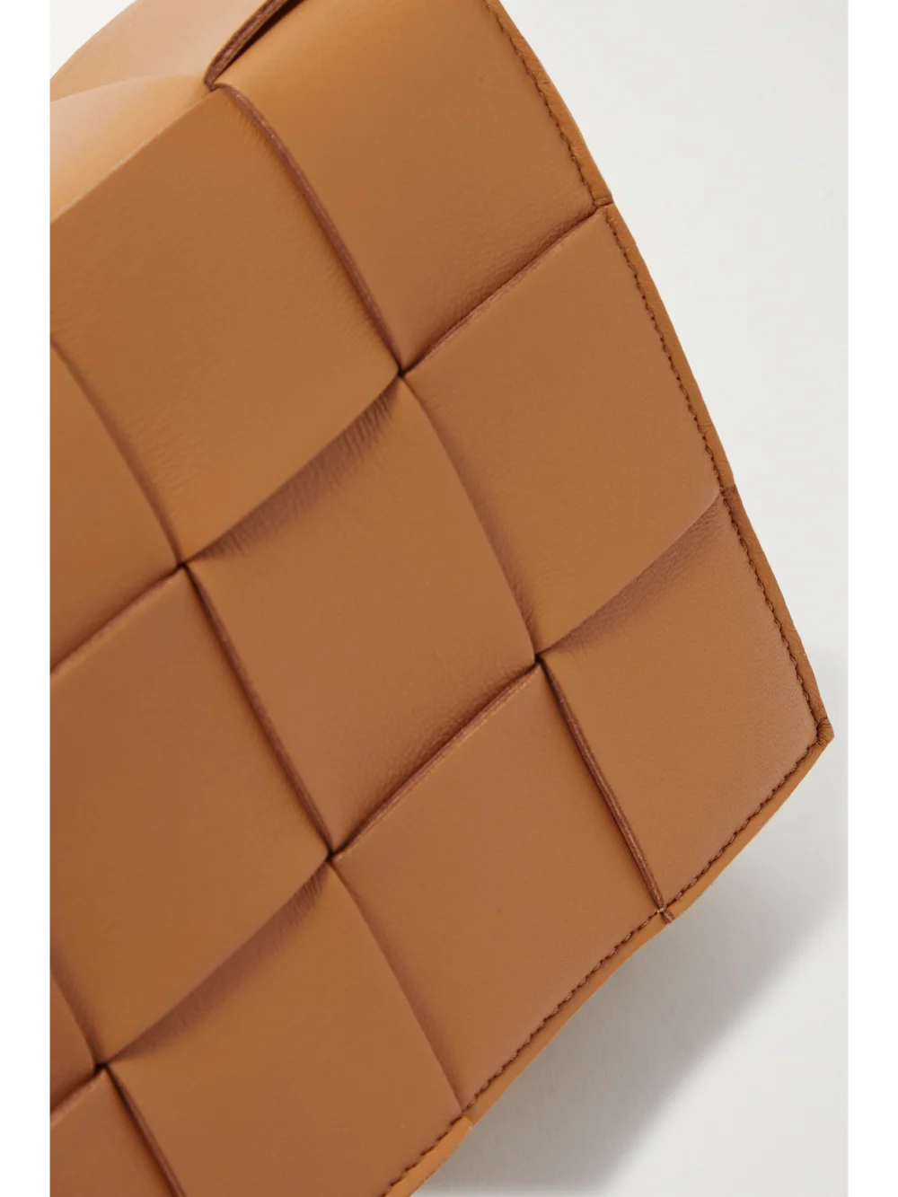 Close-up detail of the Bottega Veneta Cassette Medium Intrecciato Leather Shoulder Bag